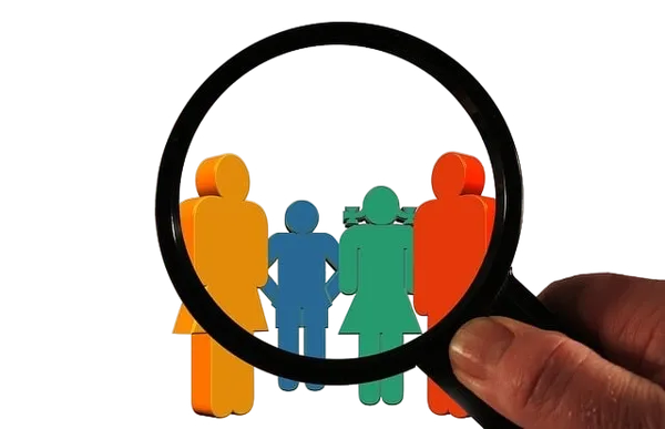 Magnifying glass shows human figures